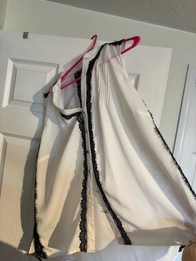 White Sleeveless Blouse with Black Lace Trim